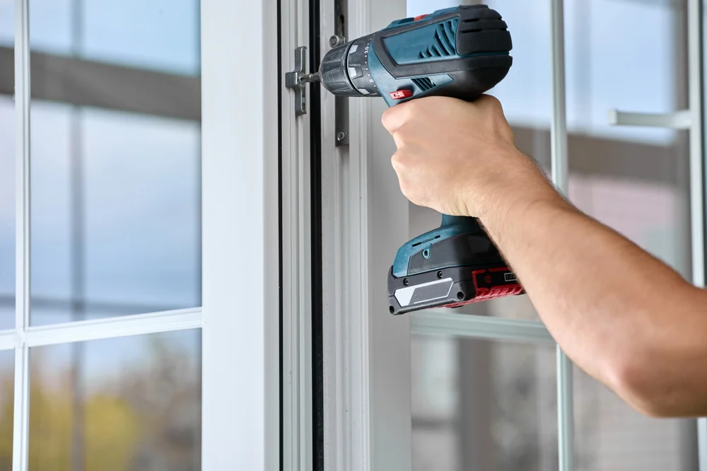 Professional window installation using power tools in New Castle County, Delaware